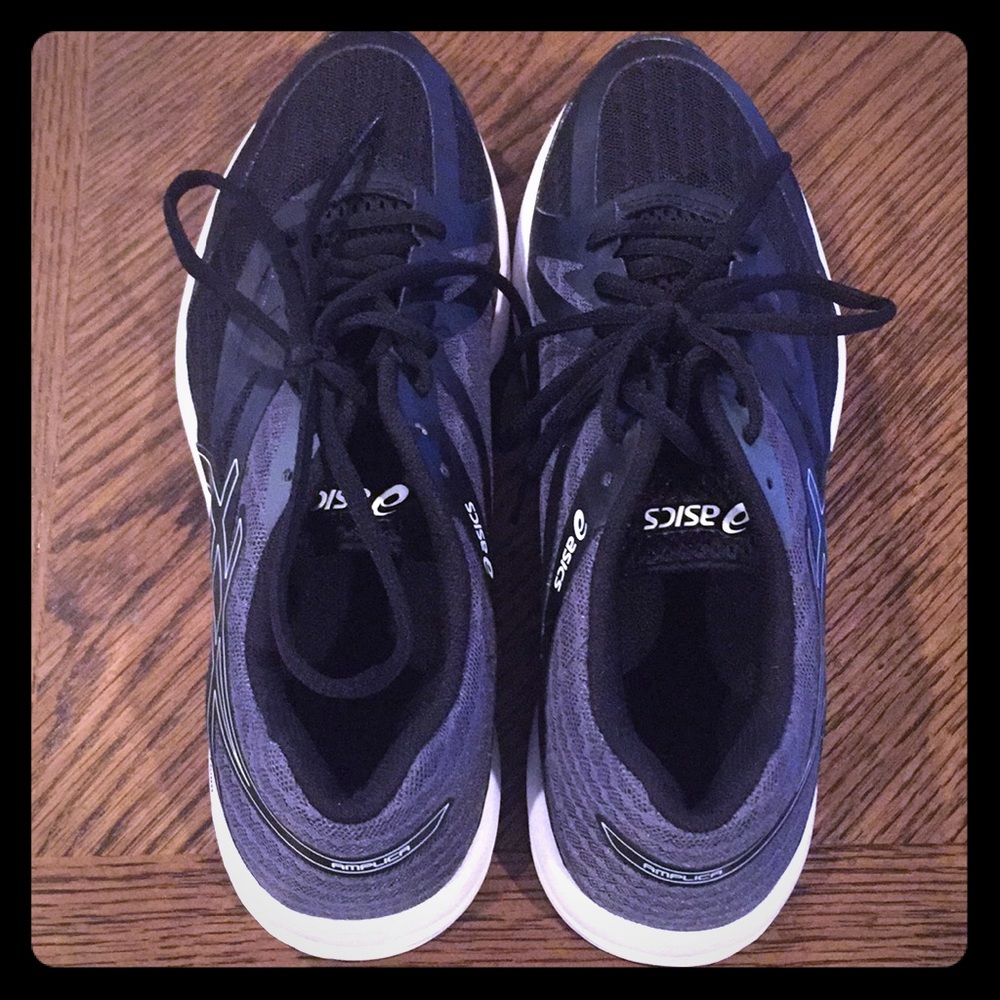 New without tags Asics woman’s running shoes.